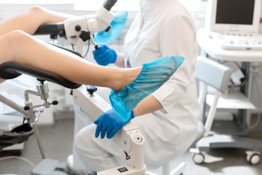 A Gynecologist Is Examined by a Patient Who Is Sitting in a Gynecological Chair