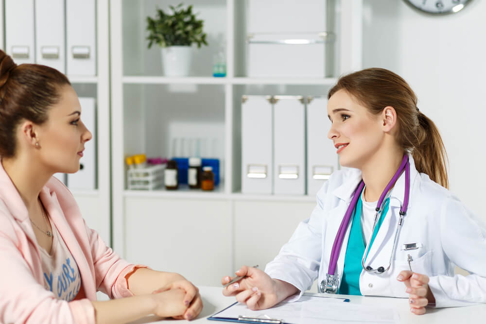 Concerned Beautiful Female Medicine Doctor Listening Carefully Patient Complaints