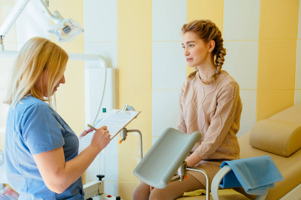 Female Patient With Doctor Gynecologist Gynecology Consultation in Medical Clinic