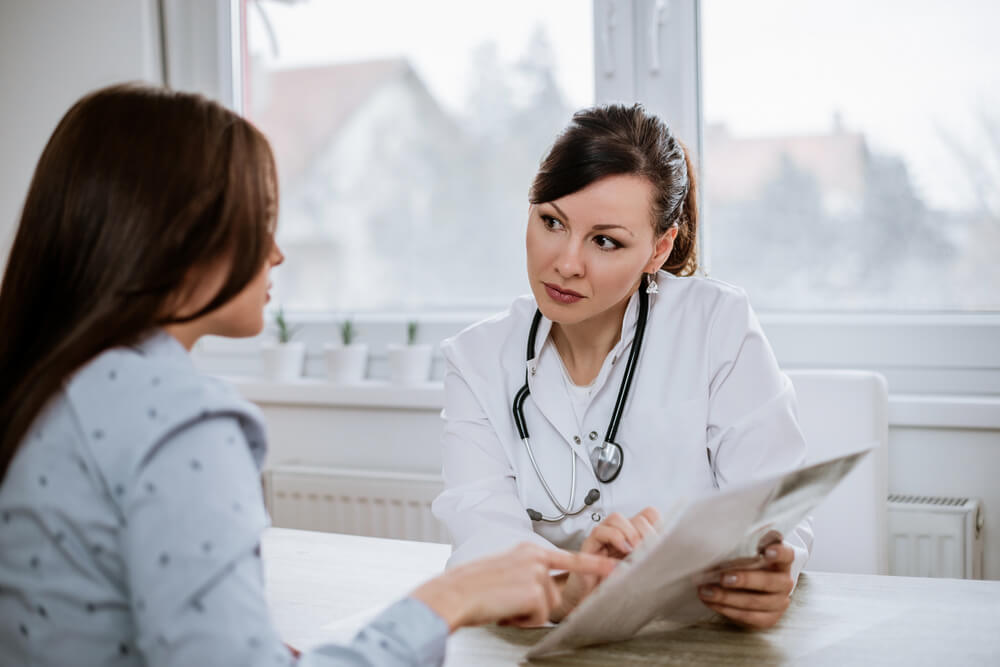 Doctor Explaining Test Results to a Patient