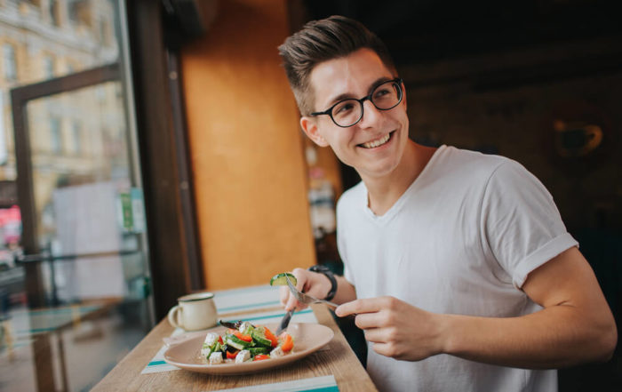 Young Man Eating a Healthy Salad