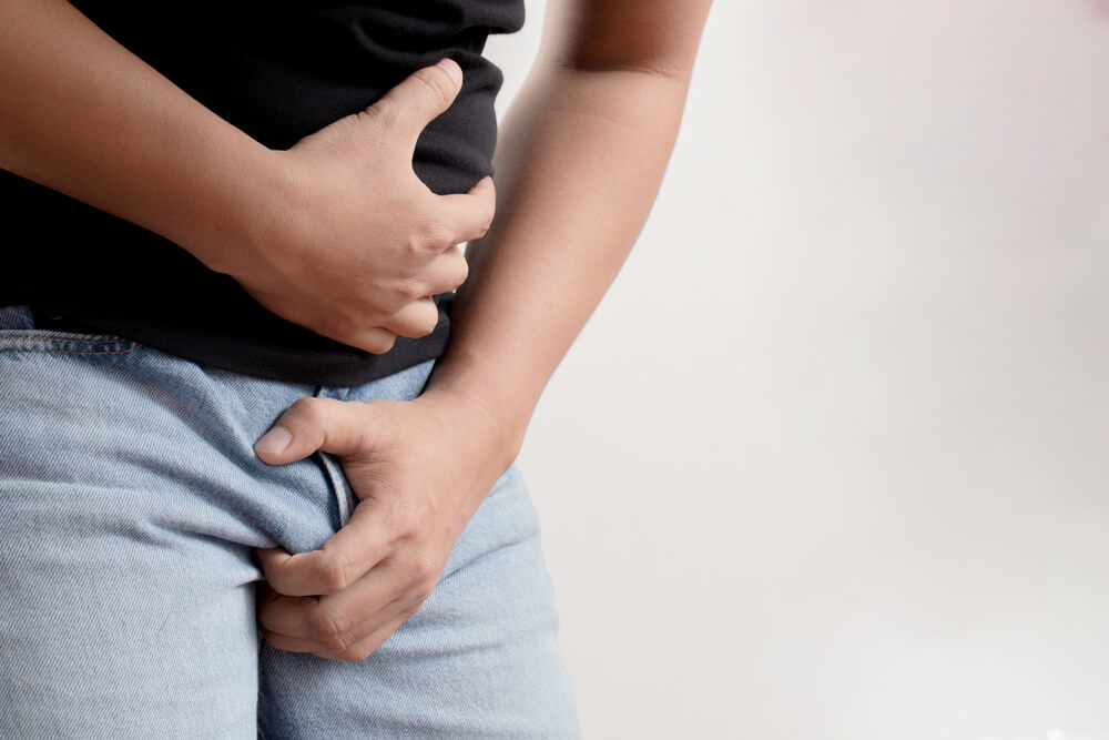 Close-up of a Young Man Holding His Penis Cause Pain Prostate Cancer Ejaculation Fertility Bladder Problems