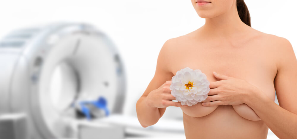 Female Breast With Flower, Ct Scan Machine on Background.