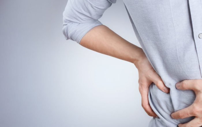 Person Feeling Terrible Pain on White Background