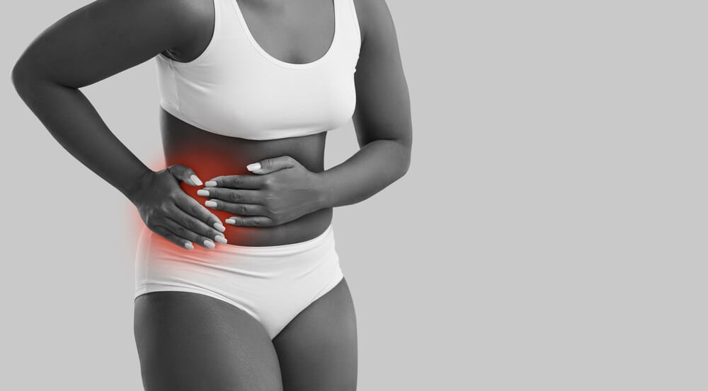 Woman Suffering From Abdominal Pain