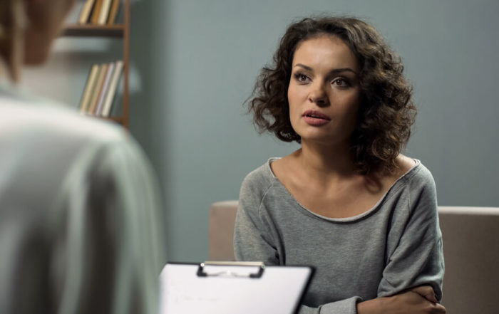 Woman Talking to Doctor