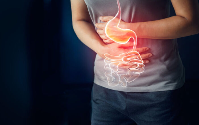 Woman Touching Stomach