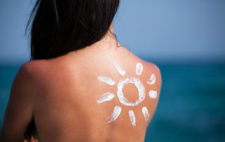 Woman’s Back With Sun Lotion