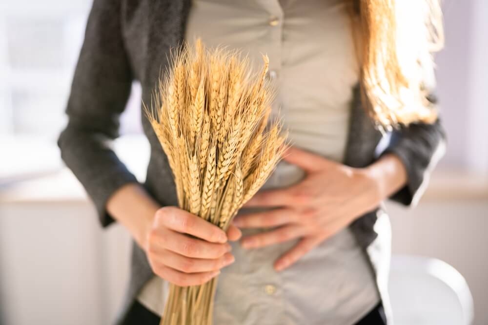 Women Holding Spikelet of Wheat