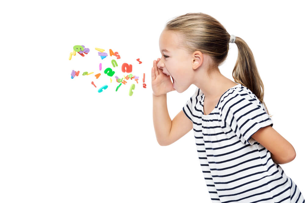 Cute Little Girl in Stripped T-Shirt Shouting Out Alphabet Letters