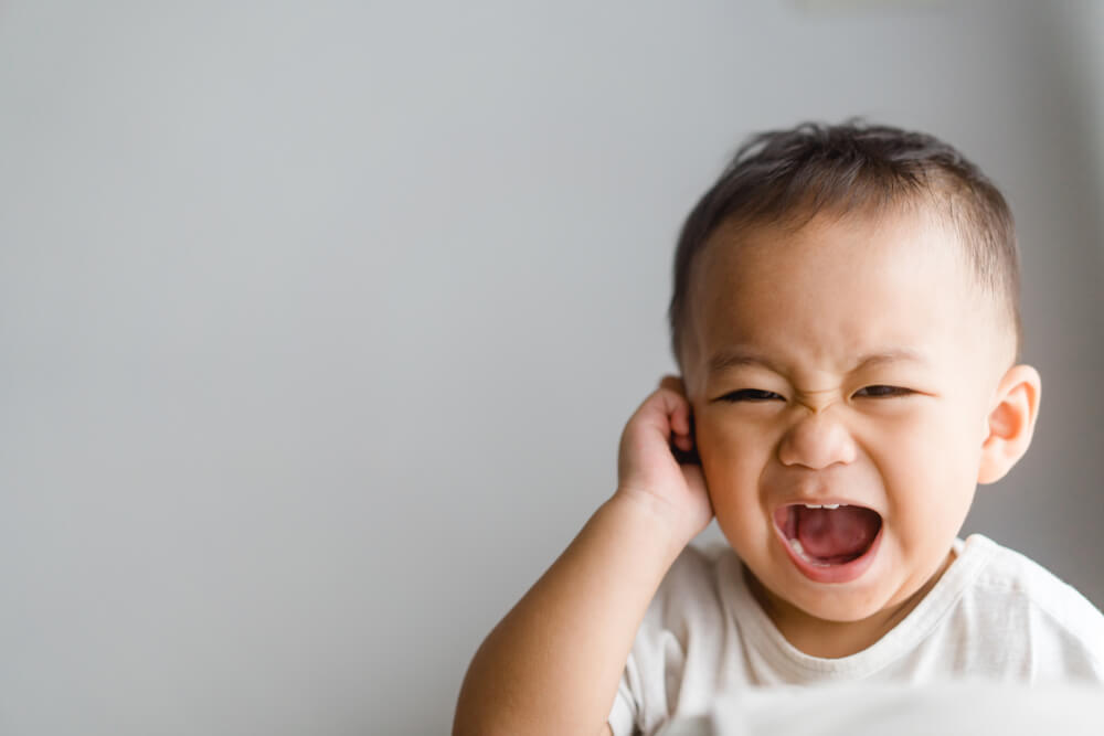 Baby crying in sales pain