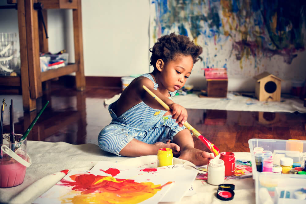 Kid Enjoying  Painting