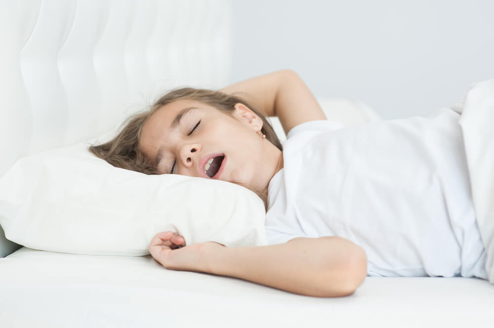 Baby breathing best sale loud while sleeping