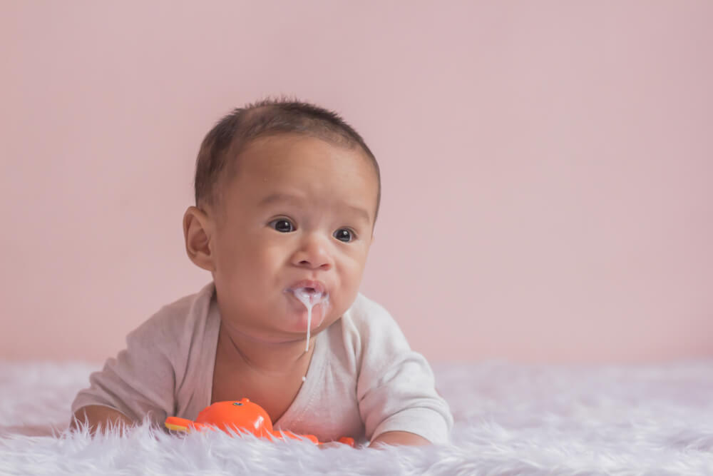 Baby Spit Up: Everything You Need To Know