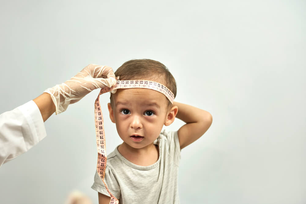 Doctor Measuring Baby Head Circumference.