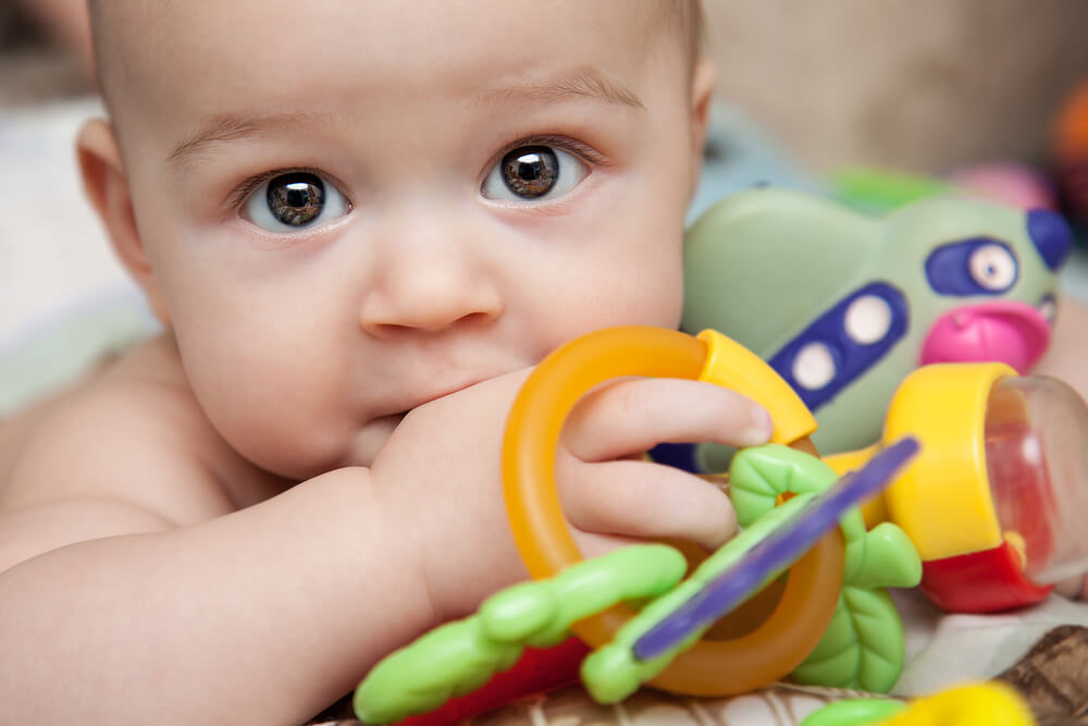 Child With Colorful Toys