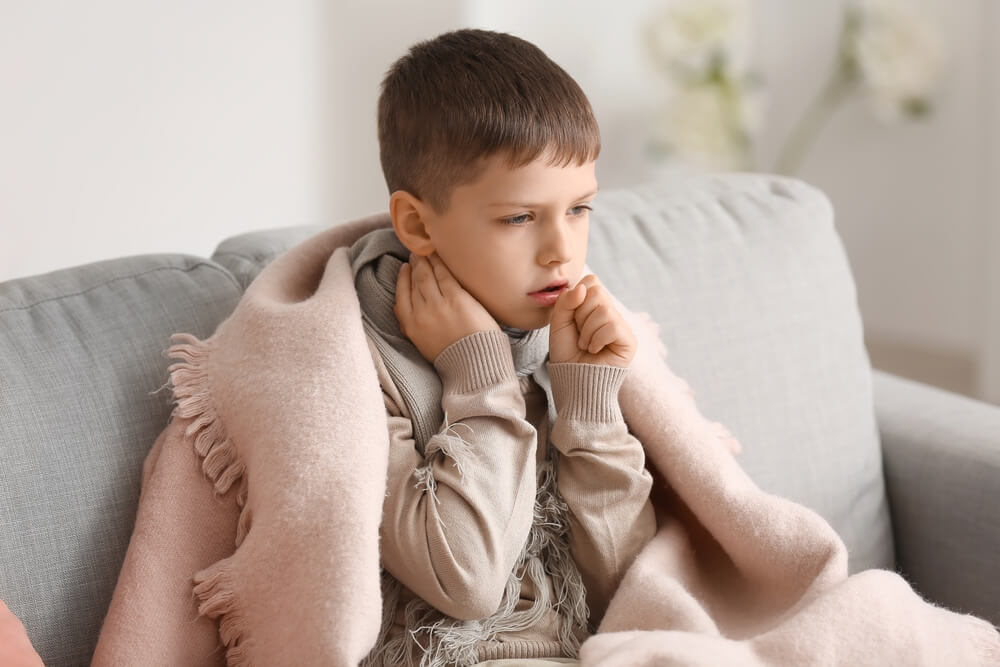 Ill Little Boy With Sore Throat at Home