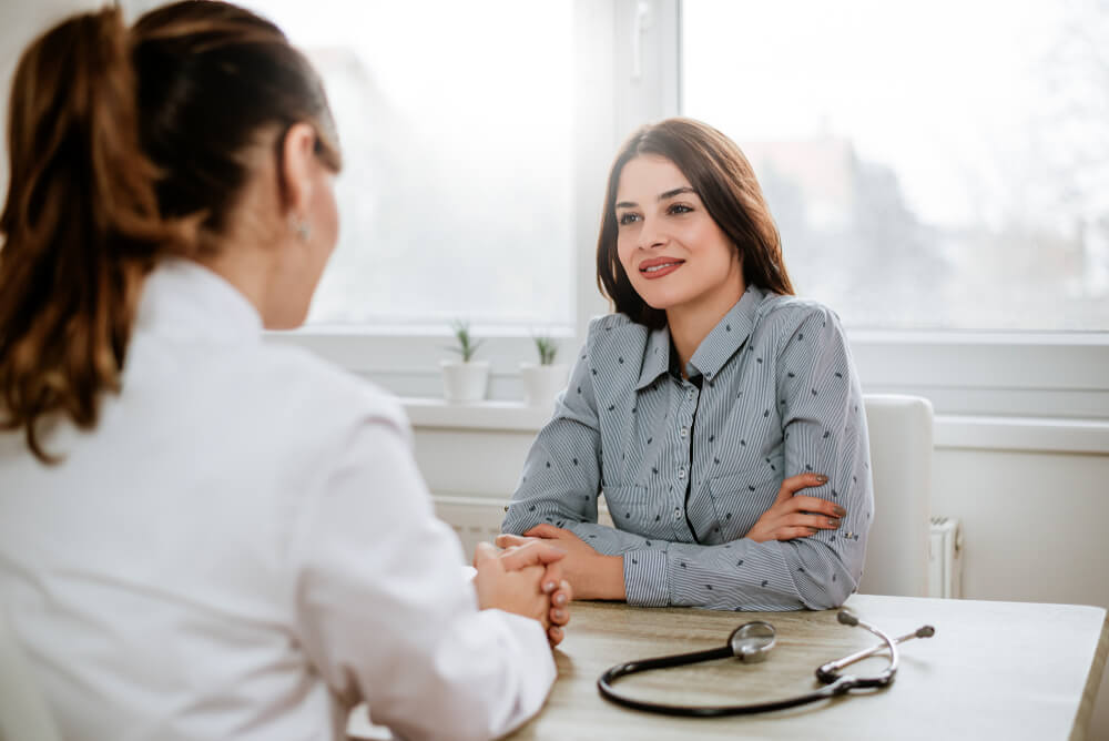 Young Brunette Woman at Doctor's Office