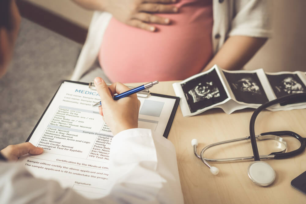 Pregnant Woman At Doctors