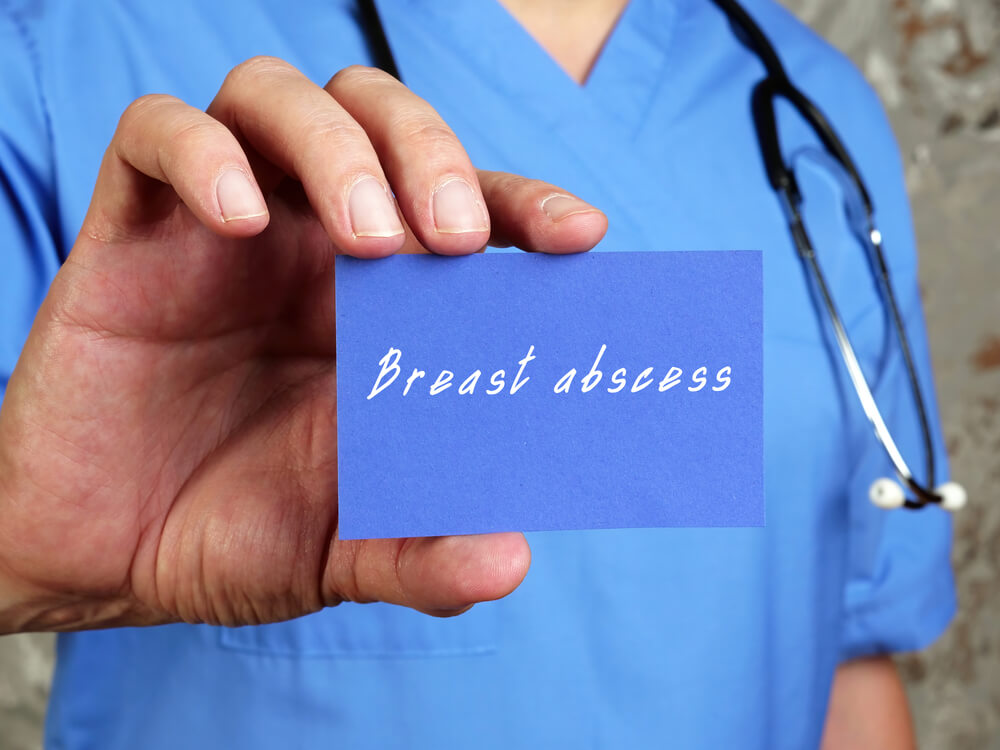 Doctor Holding Breast Abscess Sign 