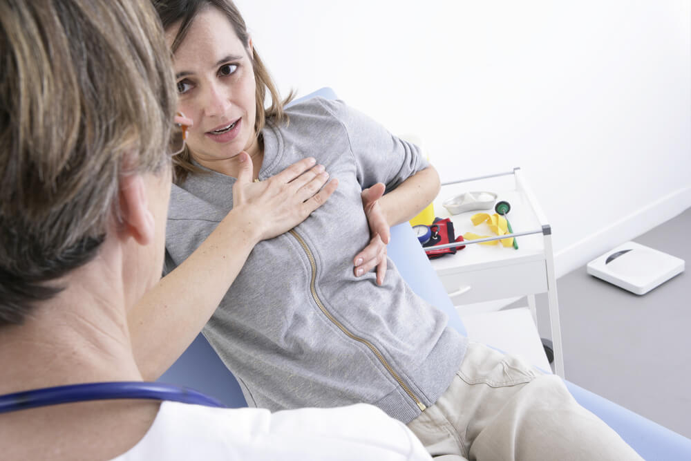 Woman At Hospital Consultation