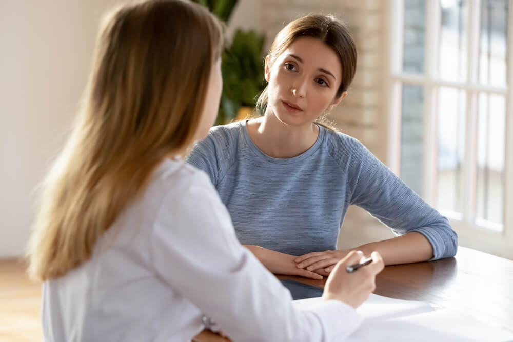 A Woman Patient in Consultation With the Doctor