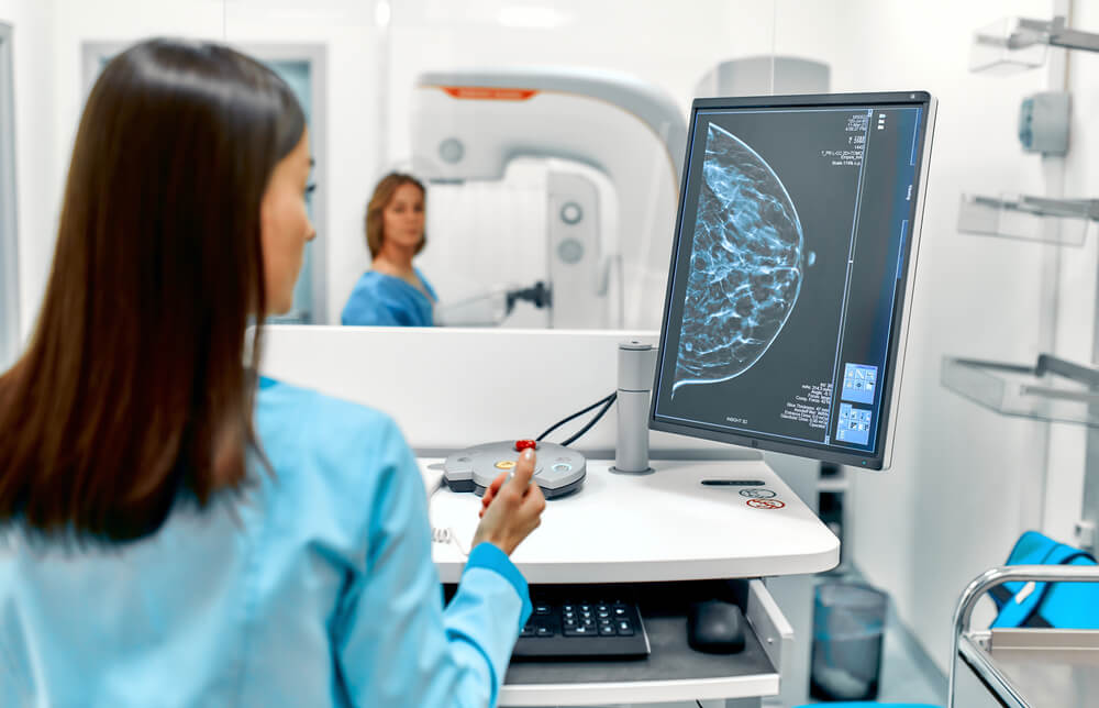 The patient undergoes a screening procedure for a mammogram