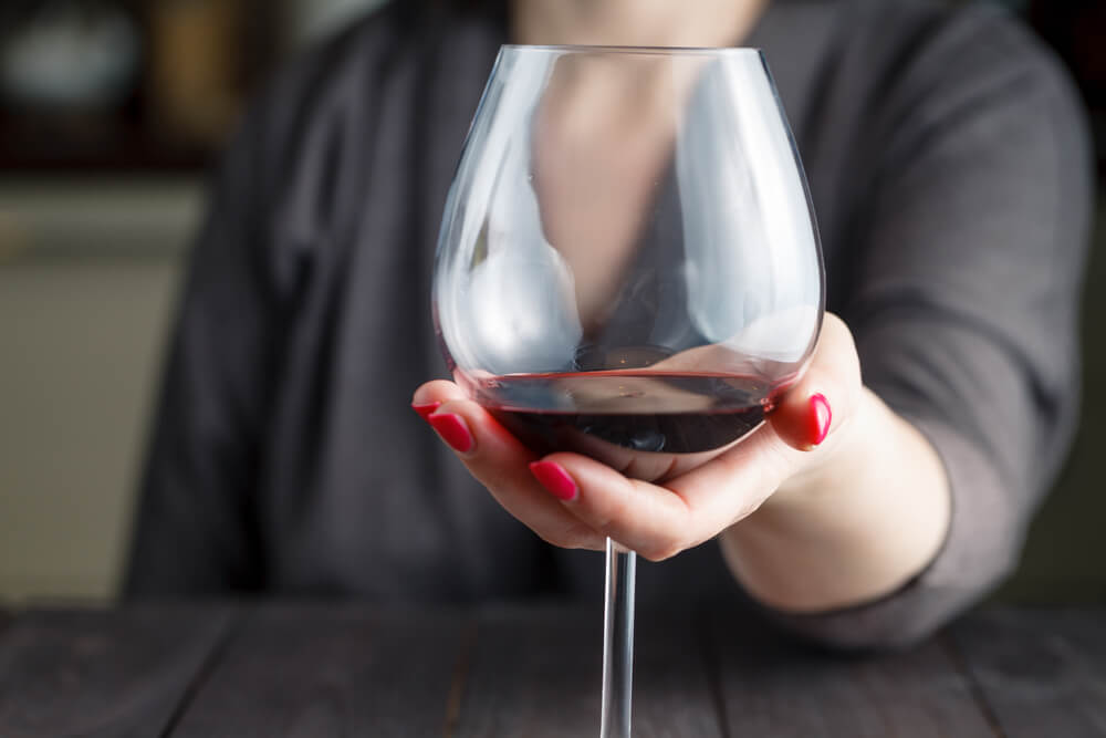 Woman Drinking Alcohol On Dark Background Focus On Wine Glass