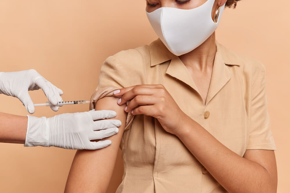 Woman Receiving a Vaccine