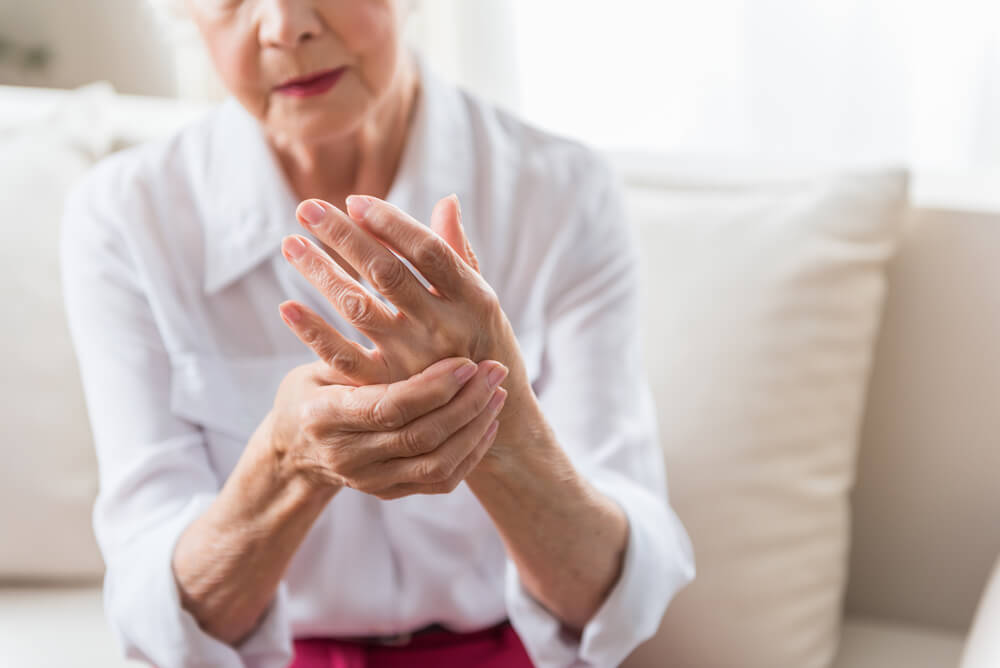 Elderly Female Expressing Pain in Hands