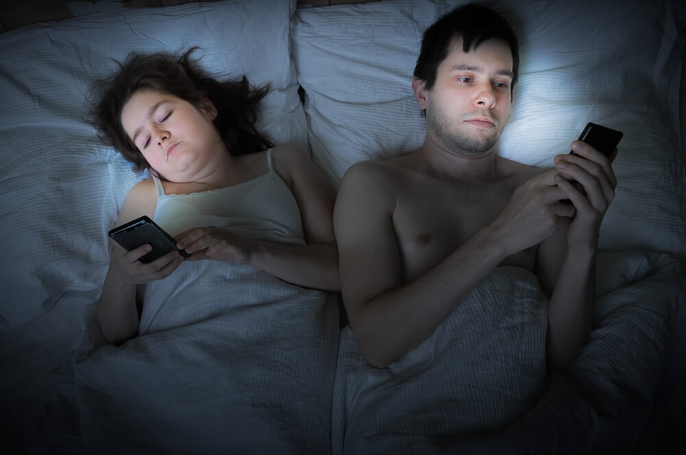  Young Couple Is Lying in Bed and Cant Sleep