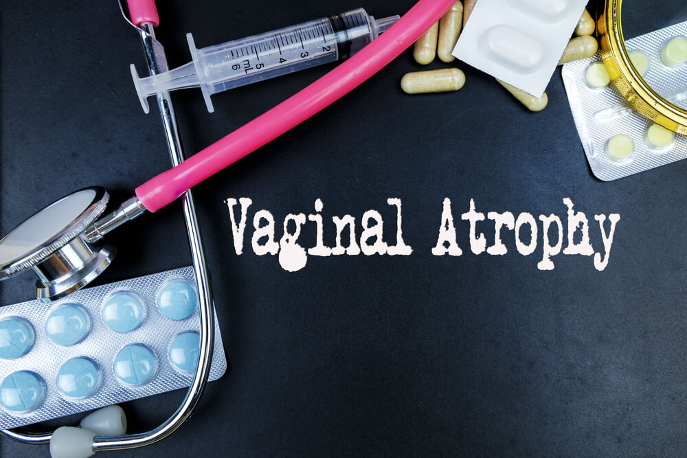 Vaginal Atrophy Word, Medical Term Word With Medical Concepts in Blackboard and Medical Equipment Background