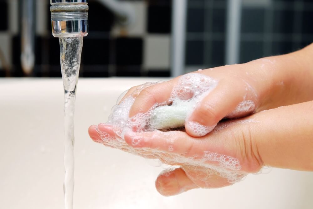 A Girl Washing Her Little Hands