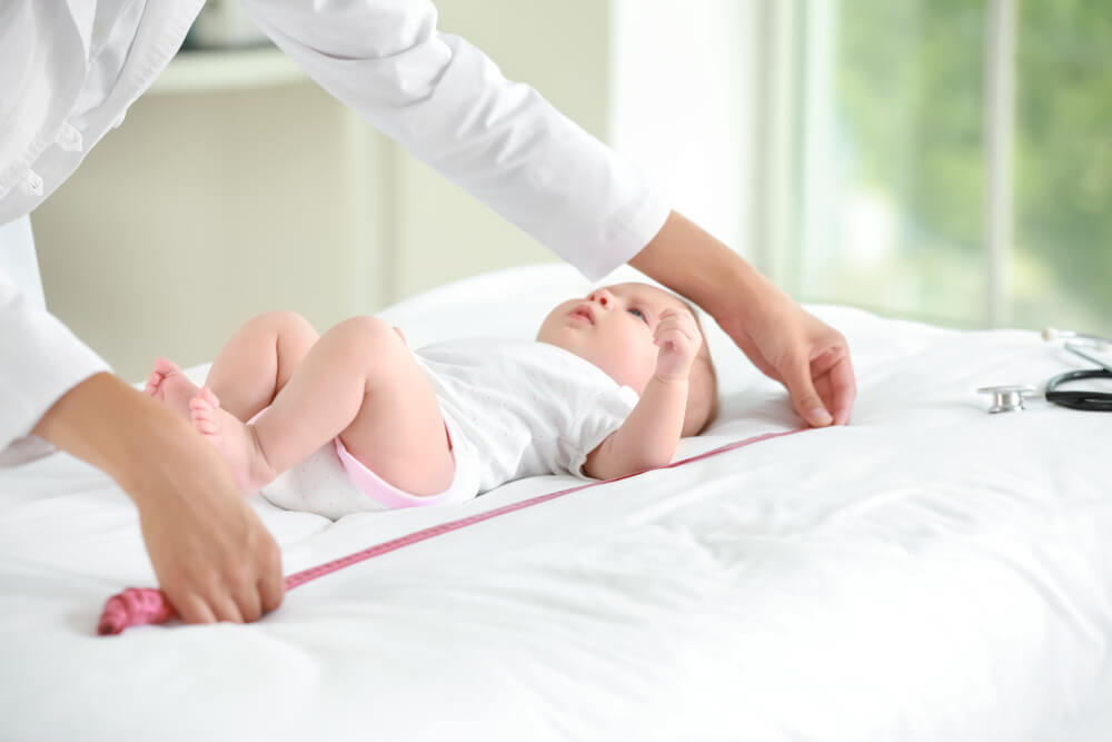 Pediatrician Measuring Baby