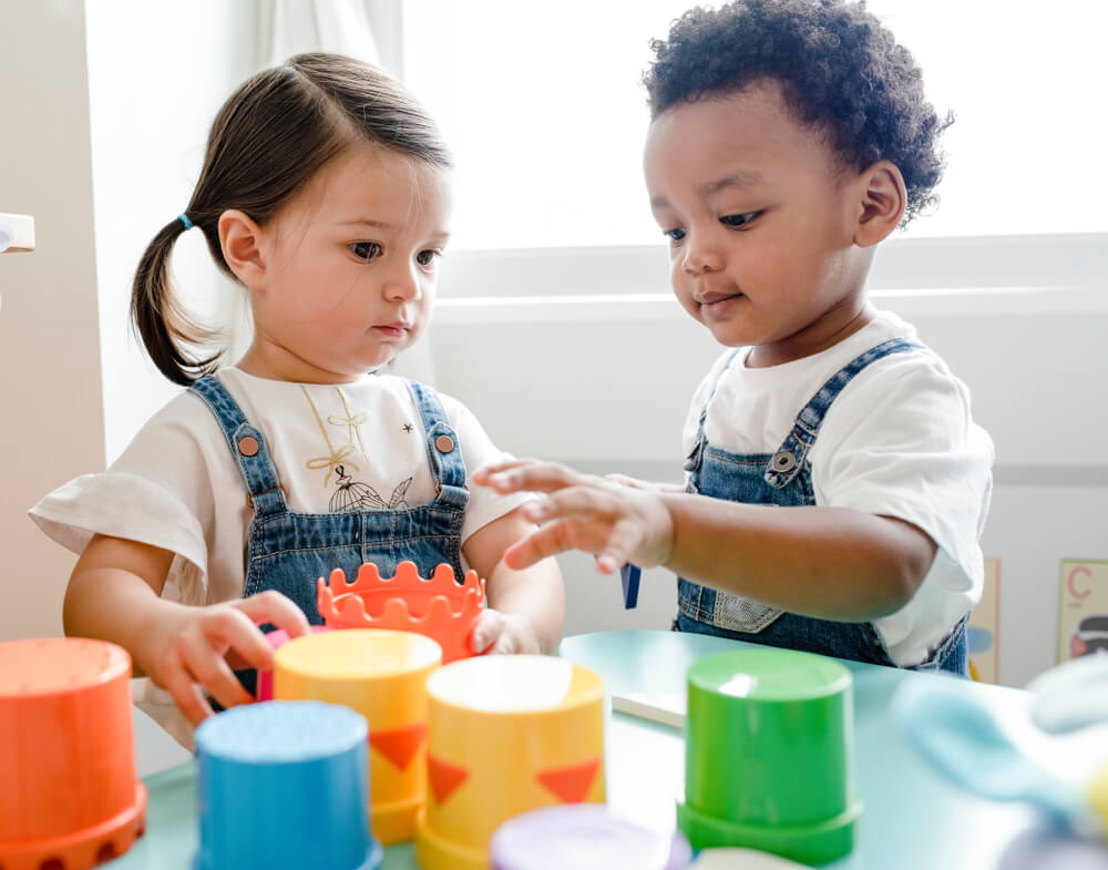 Little Kids Playing Toys at Learning Center