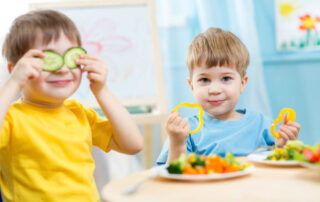 Kids Eating Healthy Food In Kindergarten Or At Home
