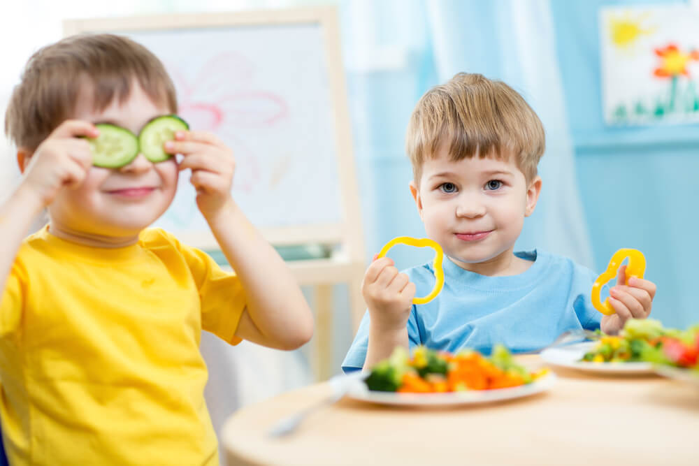Kids Eating Healthy Food In Kindergarten Or At Home