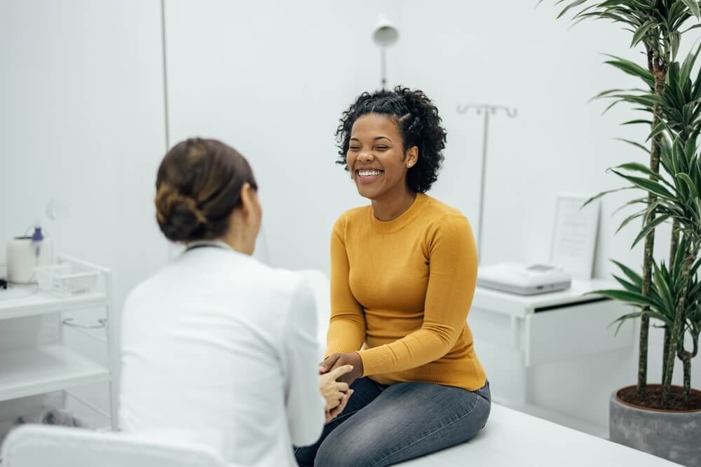 Excited Woman Happy to Hear Good News From a Doctor