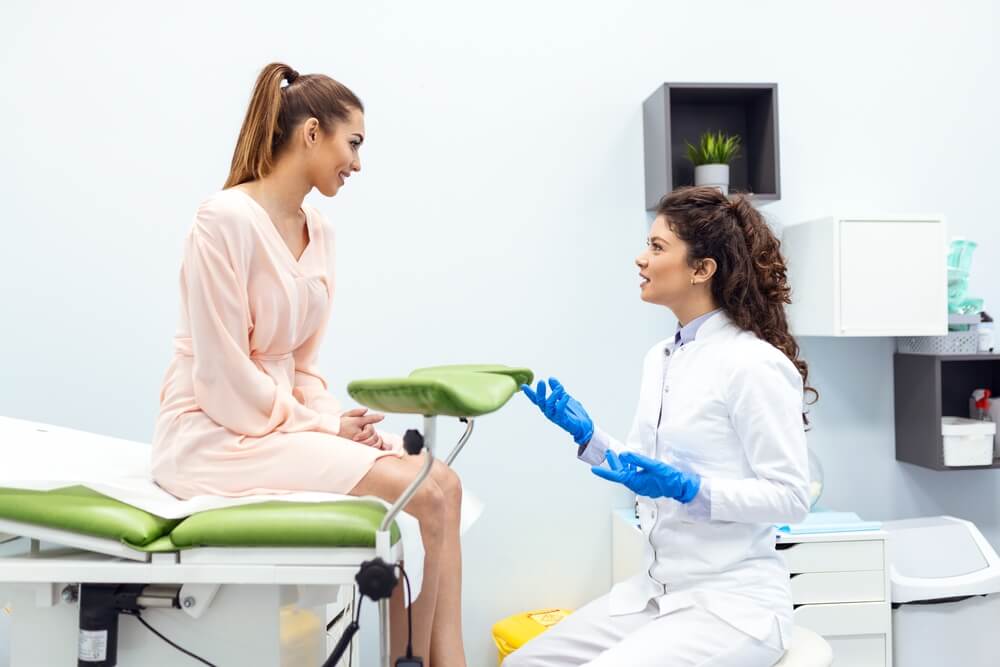 Gynecologist consultation, women's health treatment.