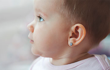 toddler with an ear piercing-1