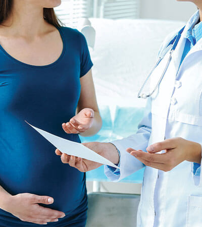 young woman in blue shirt prenatal consultation-2