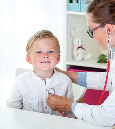 blue haired boy getting a stethoscope exam-2