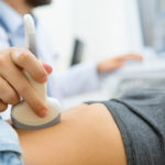 A patient of the Diagnostic Center of Miami receiving an abdominal ultrasound.