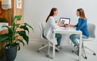 Gynecologist Consulting a Woman Patient, Talking About Women’s Health and Diseases of Uterus and Ovaries