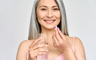Smiling adult woman taking care of health in menopause.