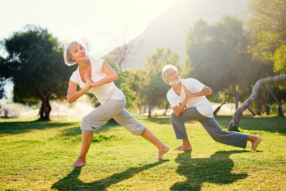 Senior Family Couple Exercising Outdoors.