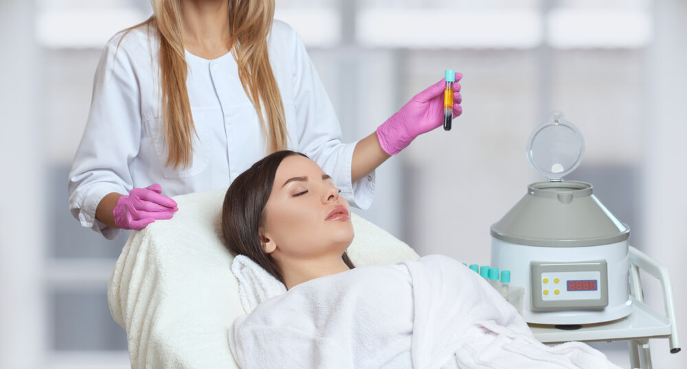 Cosmetologist Does Prp Therapy on the Face and Scalp of a Beautiful, Young Woman With Clean Skin in a Beauty Salon