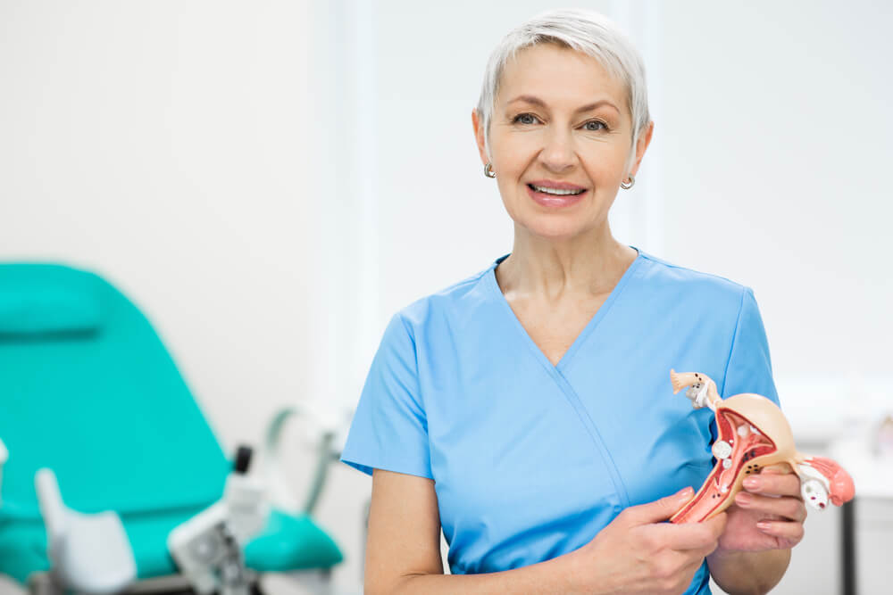 Portrait of a Mature Gynecologist. Doctor Smiling and Looking at the Camera