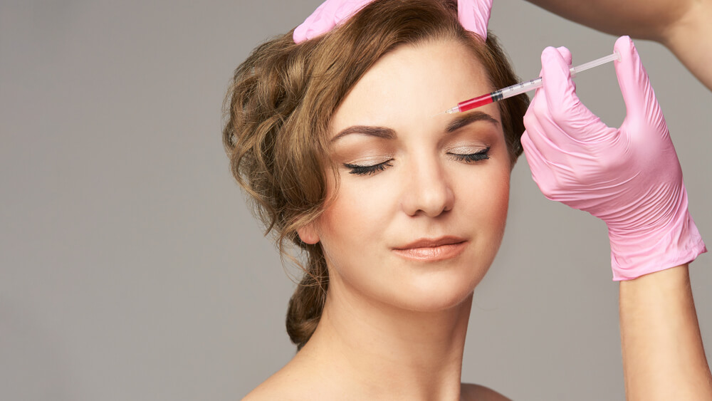 Young Woman Cosmetology Procedure.