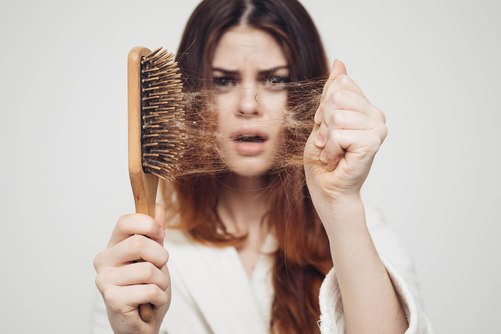 Woman Suffering From Hair Loss